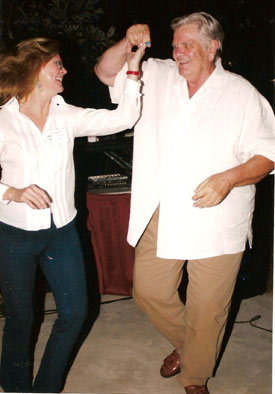 Rock ‘n’ Roll! Peter and Lynda Ford swing out at the pool party.