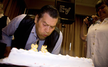 Clint Walker blows out the candles on his 85th birthday cake presented following a panel discussion by Clint’s fan club members.