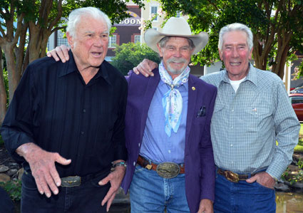 Taking a break outside Sam's Town Hotel and Casino, Robert Colbert, Buck Taylor, Bob Fuller.