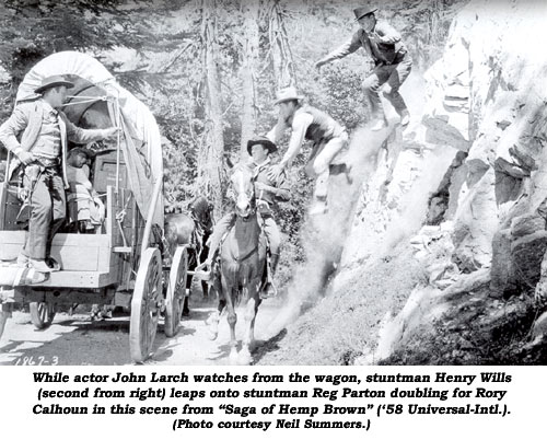 While actor John Larch watches from the wagon, stuntman Henry Wills (second from right) leaps onto stuntman Reg Parton doubling for Rory Calhoun in this scene from "Saga of Hemp Brown" ('58 Universal-International). (Photo courtesy Neil Summers.)