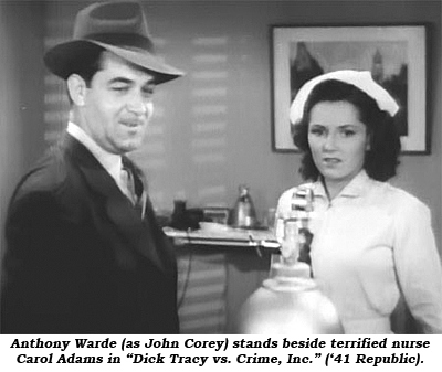 Anthony Warde (as John Corey) stans beside terrified nurse Carol Adams in "Dick Tracy vs. Crime, Inc." ('41 Republic).