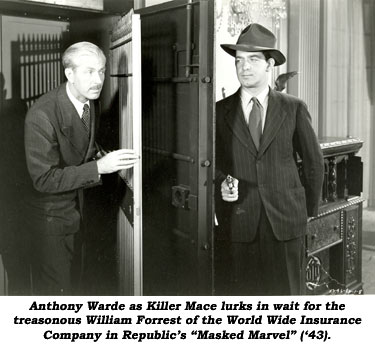 Anthony Warde as Killer Mace lurks in wait for the treasonous William Forrest of the World Wide Insurance Company in Republic's "Masked Marvel" ('43).