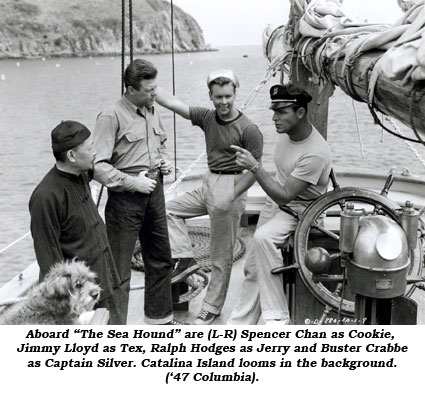 Aboard "The Sea Hound" are (L-R) Spencer Chan as Cookie, Jimmy Lloyd as Tex, Ralph Hodges as Jerry and Buster Crabbe as Captain Silver. Catalina Island looms in the background ('47 Columbia).