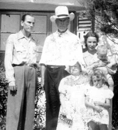 John F. White is character actor/badman Dan White’s grandson and provided the above photo to the b-westerns.com website. (L-R) Dan White, William S. Hart, Dan’s wife Tilda holding Curtis (John’s father). Standing in front is Nona Cooper, wife of actor Tex Cooper, and John’s aunt June. Nona was a munchkin in “The Wizard of Oz”.