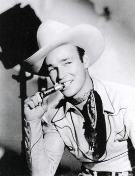 Roy Rogers enjoys a Tootsie Roll. 