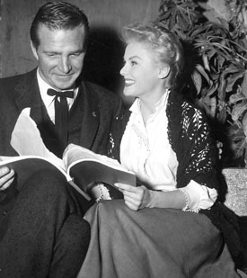 Eric Fleming and Kathleen Crowley rehearse a scene for the horror-Western 
“Curse of the Undead”. 