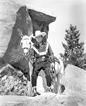 Two great photos of Whip Wilson with his horse Rocket.