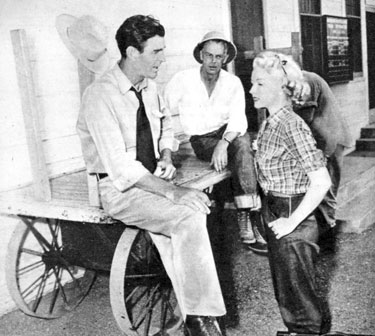 Rod Cameron, director Lesley Selander and Bonita Granville take a break from filming “Strike It Rich” (‘48 Allied Artists).