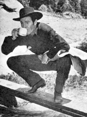 Rod Cameron takes a break from filming “Frontier Gal” (‘45 Universal).