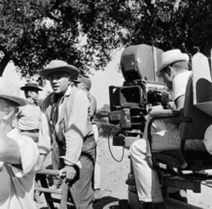 Michael Landon and Lorne Greene in between shots. 