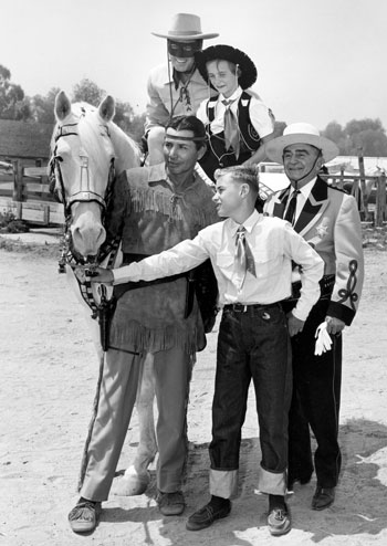 Some young fans join The Lone Ranger and Tonto at one of Sheriff Gene Biscaluz’ annual rodeoes.