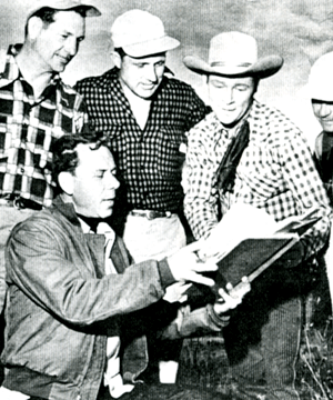 Taken during the formation of Roy Rogers Productions for his TV show. (L-R) Director Les Martinson (lower left), script supervisor/assistant director Bob Vreeland, director Robert Walker, Roy Rogers, cinematographer Joe Novak. 