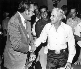 Veteran badman Myron Healey greets old friend Bob Steele at the August 1974, 3rd annual Memphis Western Film Collectors Festival. 