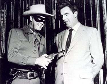 Clayton Moore as the Lone Ranger at a public appearance in Kansas City with local dignitary Matt Plunkett (2/11/56).