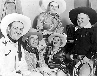 Tom Mix with (L-R) Gene Bowers, Jack Knapp, The Carlislys (rodeo performers), 
all on tour in Germany circa 1933. 