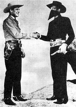 This trick photography shows Charles Starrett shaking hands with 
his alter-ego, The Durango Kid.