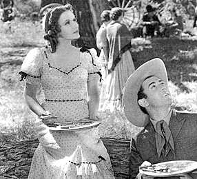 Lunch break on location with Johnny Mack Brown and leading lady ???