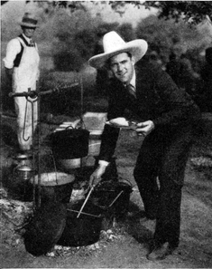 Ken Maynard hosts a Hollywood barbeque in April 1930.	
