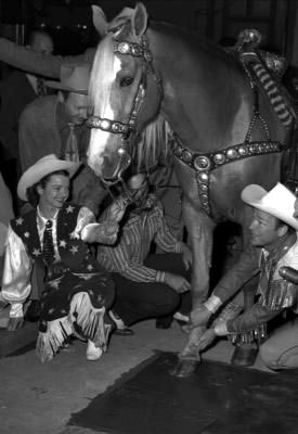 Roy helps Trigger put his hoofprints in cement at Grauman’s Chinese Theater on Hollywood Blvd.