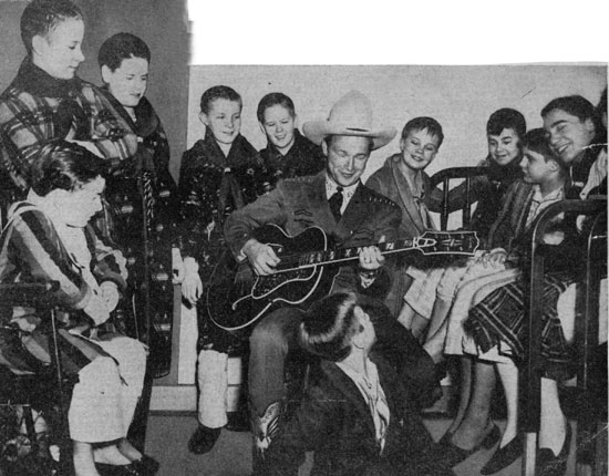 Roy Rogers entertains child heart patients at La Rabida Sanitarium in Chicago in 1944.