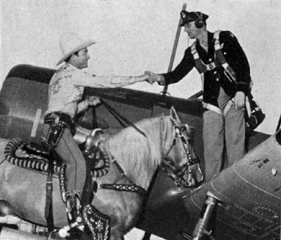 The King of the Cowboys meets the King of the Air, Col. John T. Sprague of the Waco Air Base in Waco, TX, during Roy's visit there to entertain service men in 1943.