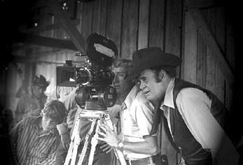 Sunset Carson checks out a camera angle for “Marshal of Windy Hollow”. (Photo courtesy Jerry Whittington.)