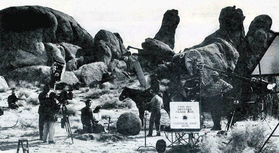 Tyrone Power and Susan Hayward wait as the 20th Century Fox crew sets up another shot for “Rawhide” (‘51) in the Alabama Hills of Lone Pine, CA. (Thanx to Jerry Whittington.)