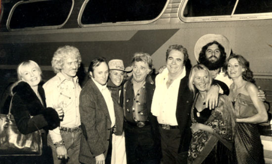 Party time! Lash LaRue (center) with (L-R) unknown, Nashville musician Jimmy Snyder, Stephen Stills (Crosby, Stills and Nash), unknown, Hoyt Axton, unknown, Honky Tonk Bill Thompson, unknown.