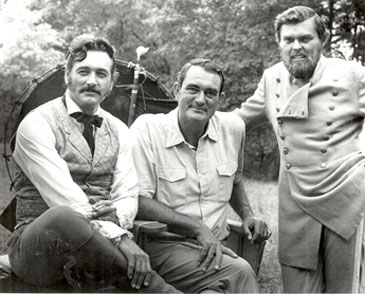 Rock Hudson, director Andrew McLagen and Ed Faulkner on location for “The Undefeated” (‘69).