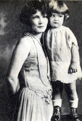 Did she know she'd grow up to become “Annie Oakley”? A young Gail Davis with her mother, Mrs. Grayson.