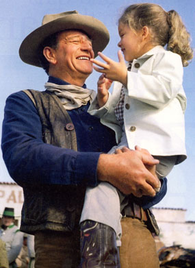 John Wayne with daughter Aissa in 1960 while making “The Alamo”.