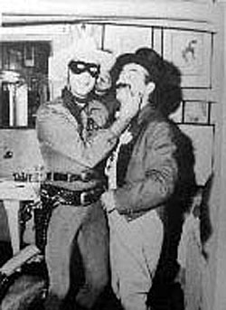 Clayton Moore as the Lone Ranger clowns around with ringmaster Jerry Colonna on TV’s “Super Circus” on February 12, 1956.