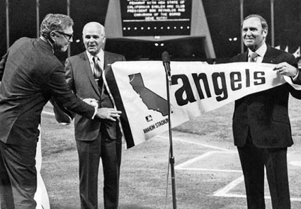 Gene presents a California Angels pennant to Anaheim Mayor Jack Dutton on January 7, 1971.