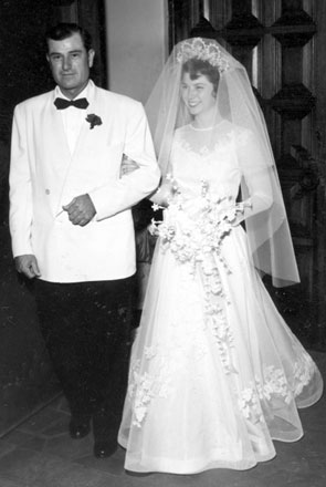 Ray Whitley walks his bride-to-be daughter down the aisle.