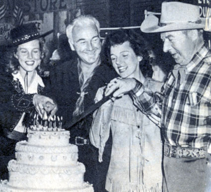 Celebrating 50 Hopalong Cassidy features in 1943 are Barbara Britton, William Boyd, Jane Wyatt and Harry “Pop” Sherman.