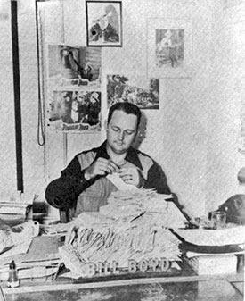 Bill “Cowboy Rambler” Boyd attacks a stack of fan mail. Boyd co-starred with Lee Powell and Art Davis in a series of six B-Westerns at PRC in 1942.