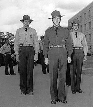 Football star and “King of the Texas Rangers” Republic serial star John Kimbrough (left) was a member of the Texas Aggies.