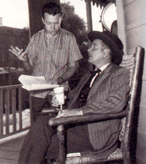 Director Arthur Hiller talks over the script of “Goodyear Theatre: The Golden Shanty” (‘59) with star Errol Flynn.