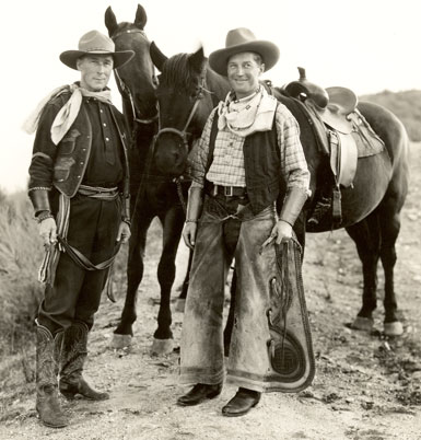 A duded up Maurice Chevalier visits silent Western star William S. Hart at Hart’s ranch in Newhall, CA. 