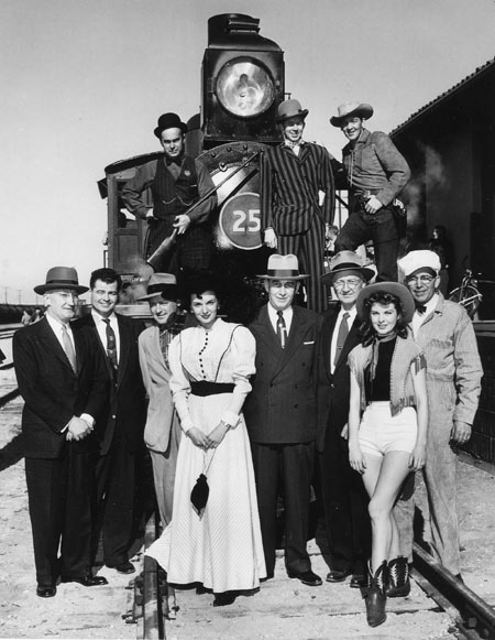 Actress Jan Shepard (in shorts) represented Union Pacific Railroad as Miss Union Pacific for two years, circa '52-'54. She did all advertising for Union Pacific during that time. Her husband-to-be, Dick London is standing on top of the train, to the right. London played Morgan Earp on Hugh O'Brian's "Wyatt Earp" TV series.