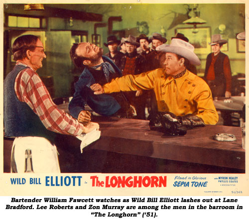 Bartender William Fawcett watches as Wild Bill Elliott lashes out at Lane Bradford. Lee Roberts and Zon Murray are among the men in the barroom in "The Longhorn" ('51).