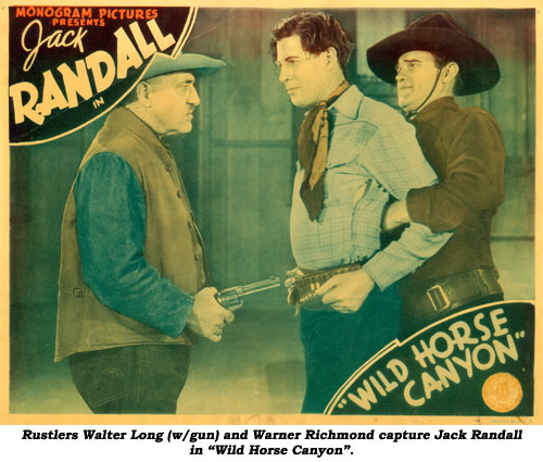 Rustlers Walter Long (w/gun) and Warner Richmond capture Jack Randall in "Wild Horse Canyon".